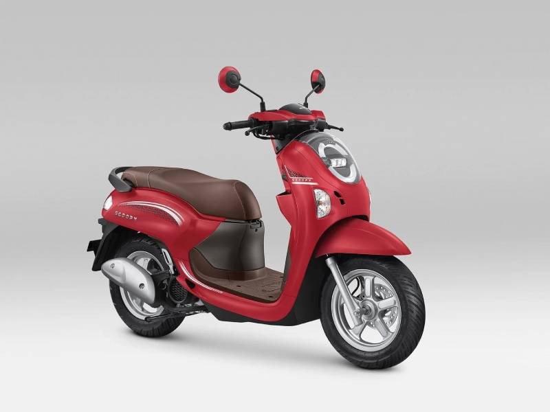 Hình ảnh chiếc Honda Scoopy màu sắc tươi sáng, thể hiện sự trẻ trung và dễ dàng điều khiển