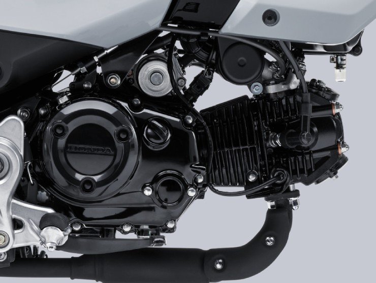 Hình ảnh một chiếc xe máy mini Honda với hệ thống phanh đĩa ABS và phuộc trước hành trình ngược