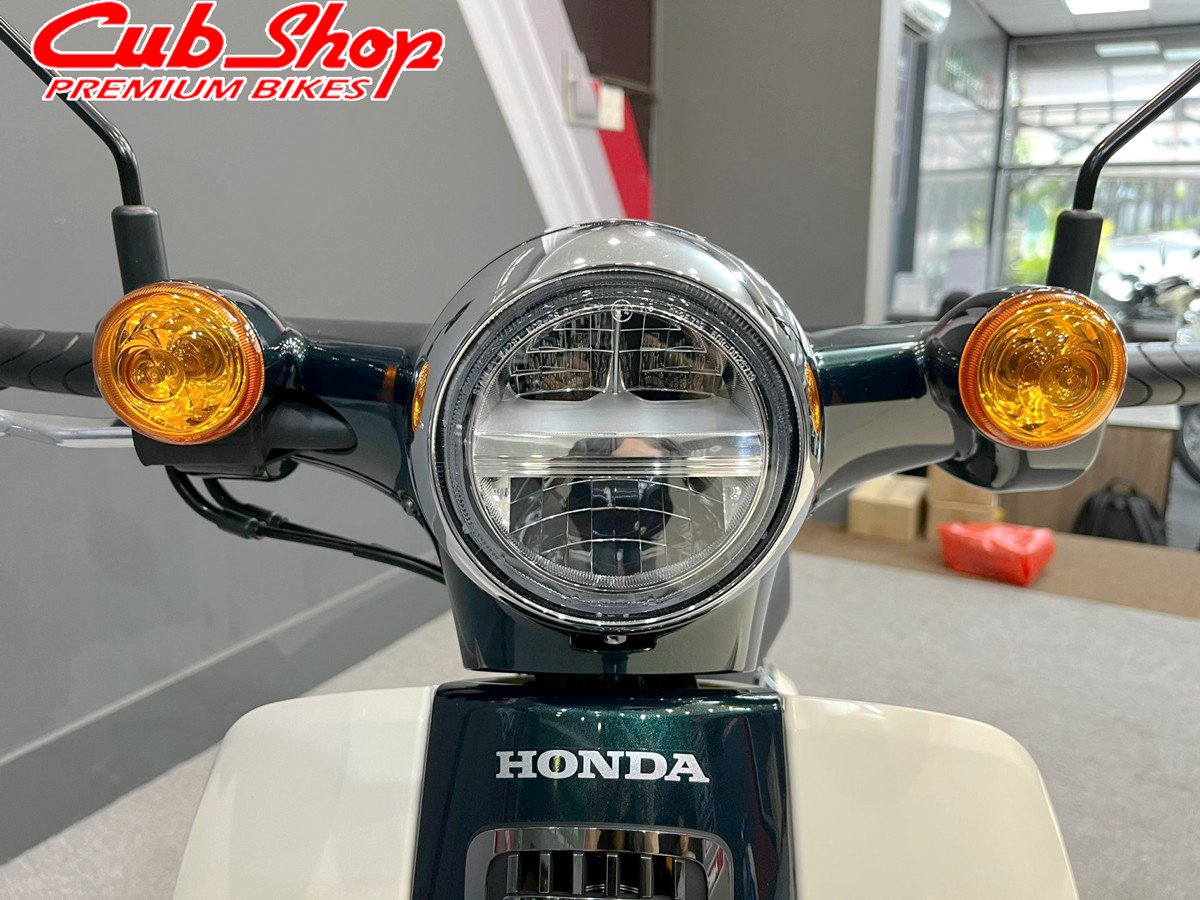 Đèn pha LED tròn kết hợp đèn xi nhan Halogen trên xe Cub 50