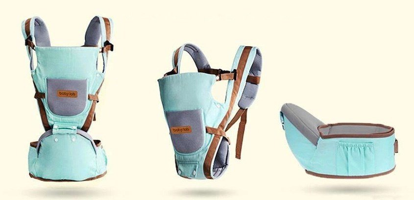 Địu em bé là lựa chọn phổ biến cho các bé dưới 3 tuổi khi đi xe máy