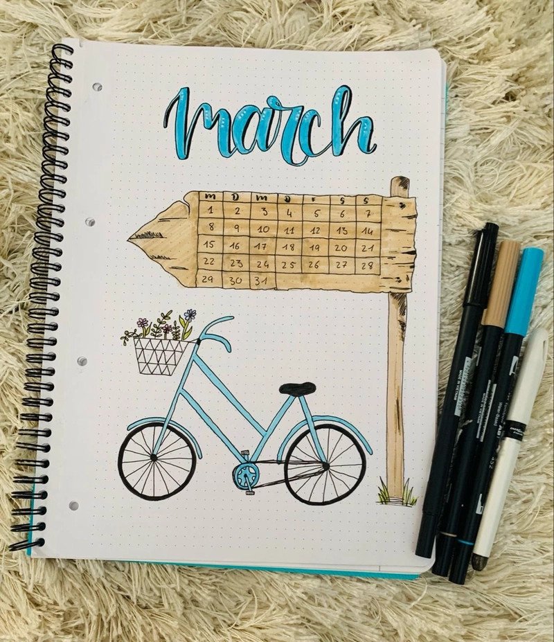 Hình ảnh các dụng cụ vẽ cơ bản như bút chì, giấy và tẩy đặt cạnh nhau