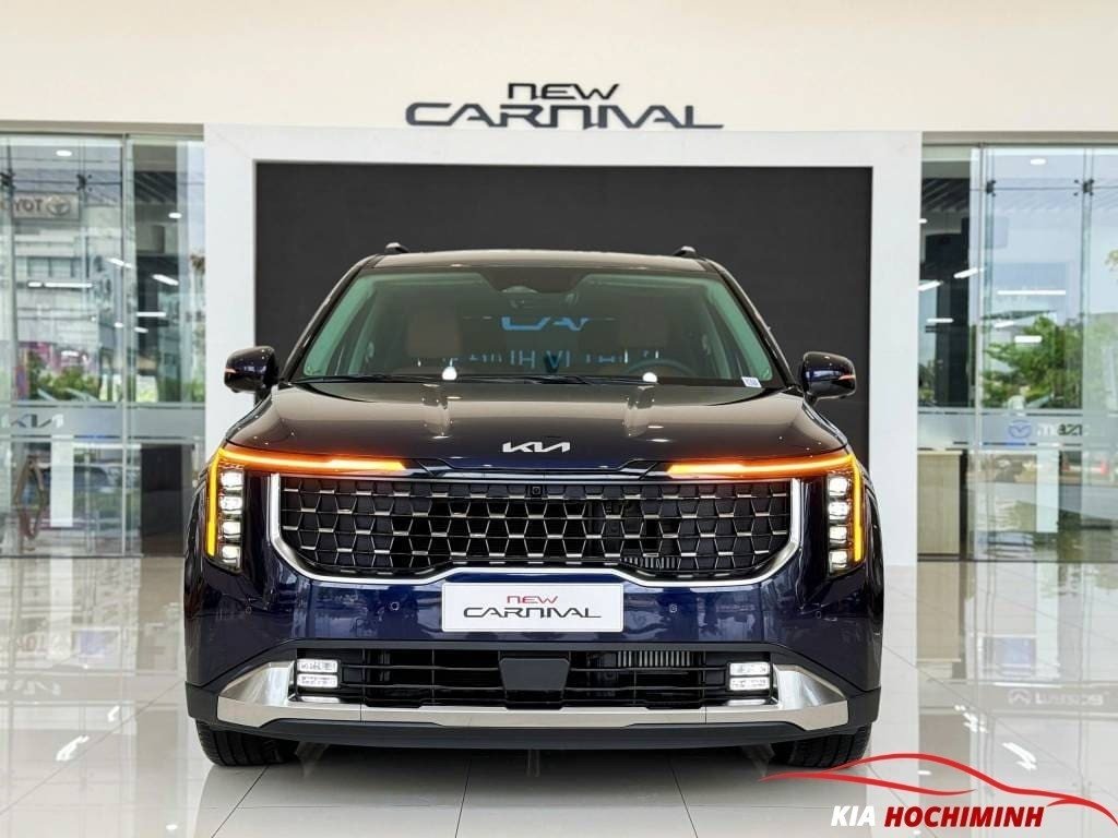 Đánh Giá Chi Tiết **Xe Kia Carnival 9 Chỗ** Mới Nhất Hình ảnh minh họa màu xanh tím D9B