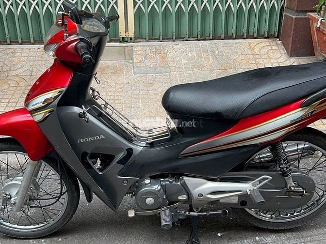 Hình ảnh minh họa một chiếc Honda Wave cũ với thiết kế đơn giản