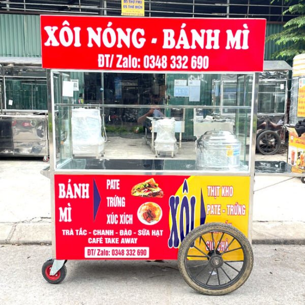 Hình ảnh minh họa một chiếc xe đẩy bán hàng rong bằng inox sáng bóng, có mái che.
