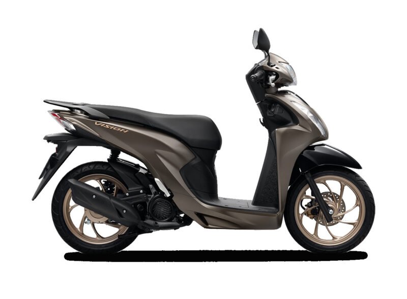 Hình ảnh minh họa một chiếc xe máy Honda Vision đang chạy trên đường phố Việt Nam