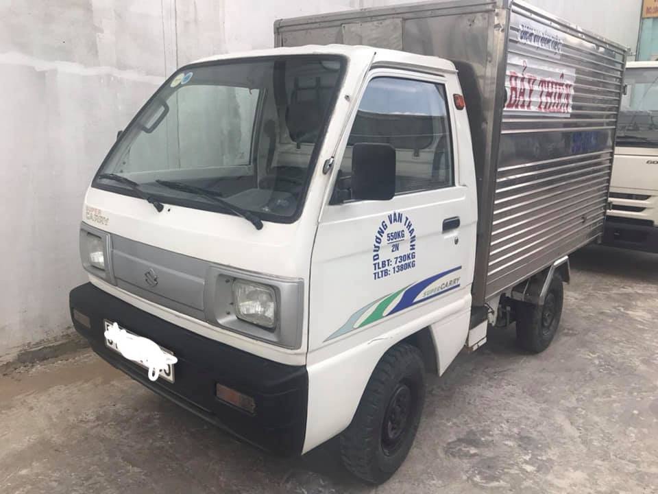 Hình ảnh minh họa xe tải Suzuki 500kg đời 2010 với thùng kín và thùng bạt
