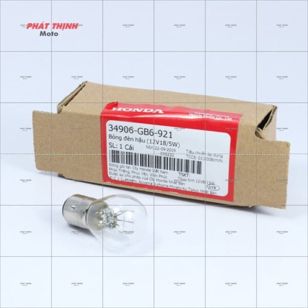 Hình ảnh mô tả cận cảnh một bóng đèn hậu xe máy đang phát sáng