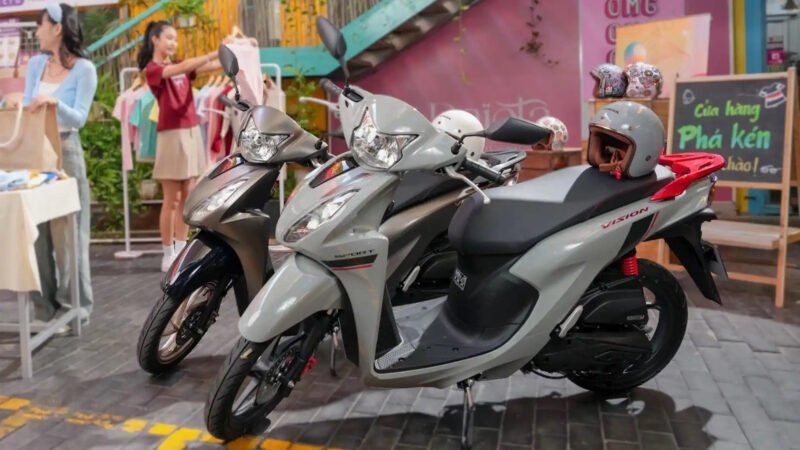 Hình ảnh một chiếc Honda Vision với nhiều màu sắc trẻ trung, thể hiện sự nhỏ gọn phù hợp với nữ giới