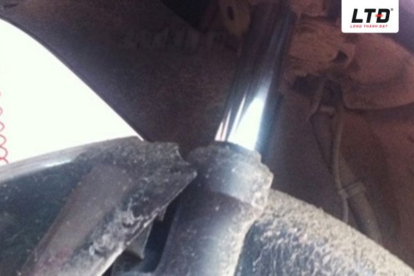 Mô tả hoạt động giảm xóc của phuộc trước xe máy