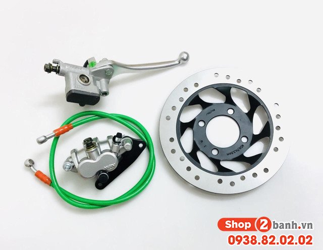 Sơ đồ mô tả quá trình piston ép má phanh vào đĩa