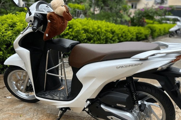 Trẻ 8 tháng ngồi ghế xe máy được không